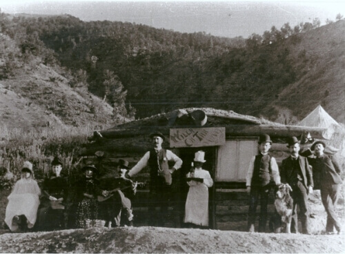 defiance-1860s-family-in-front-of-hut
