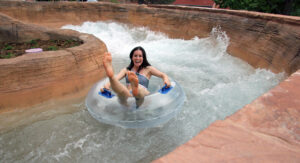 Woman sitting on tube enjoying Glenwood Hot Springs river ride
