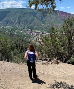 Woman looking at view of Glenwood Springs from Boy Scout Trail