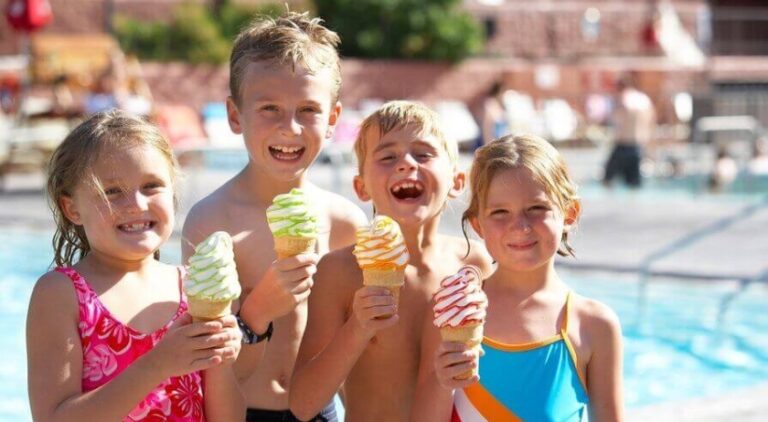 kids laughing and holding ice-cream