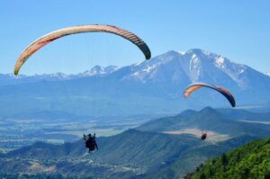 paragliders over roaring fork valley