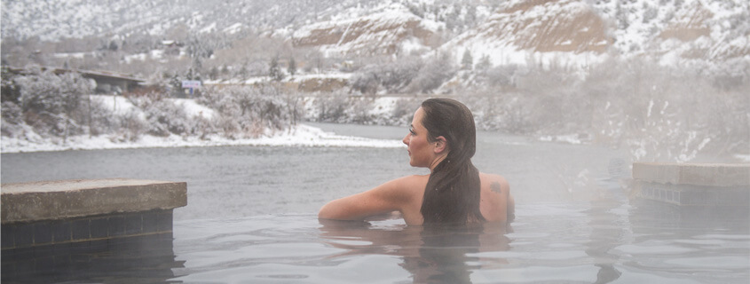 Woman soaking at Iron Mountain Hot Springs
