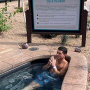 Man enjoying the Cold Plunge pool at Upriver, Iron Mountain Hot Springs