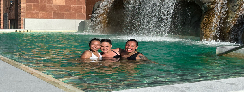 Family soaking in the new Falling Waters pool at Glenwood Hot Springs Resort