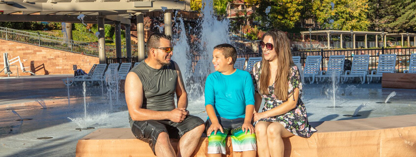 Family enjoying the Glenwood Hot Springs Resort Sopris Splash Zone