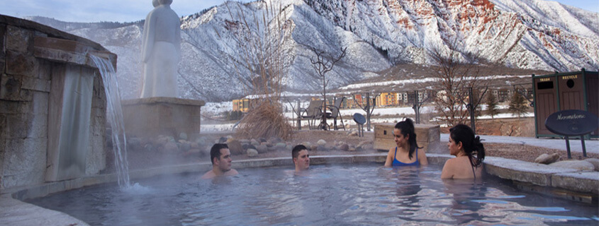 Family soaking at Iron Mountain Hot Springs in Winter