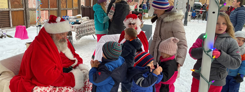 Santa and children at Grand Holiday